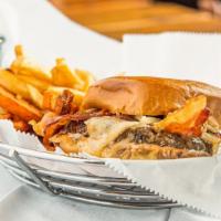 Frita By Kush · Voted one of the top 52 burgers in the USA. Topped with melted swiss, guava jelly, potato si...