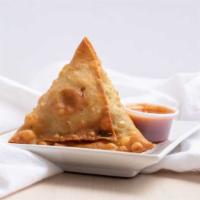 Chicken Samosa (1 Pcs) · Puffed pastry stuffed with ground chicken, green peas and house spices