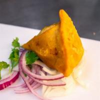 Lamb Samosa (1 Pcs) · Puffed pastry stuffed with ground lamb and house spices