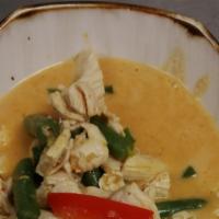 Thai Panang Curry · Medium spicy curry in Coconut Milk, Green Beans, Bell Peppers & Peanuts.
