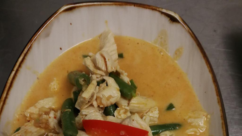 Thai Panang Curry · Medium spicy curry in Coconut Milk, Green Beans, Bell Peppers & Peanuts.