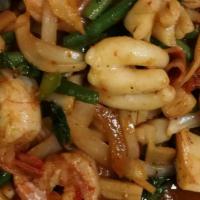 Pad Phet · Spicy level 2. Stir-fried Onions, Bell Peppers, Bamboo Shoots, Green Beans & Basil in Savory...