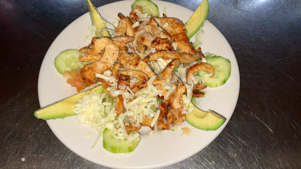Chicken Salad · Grilled chicken on top of lettuce, tomatoes, onions, cucumber shredded cheese, avocado and sour cream. Comes with ranch, blue cheese, or Thousand Island dressing.