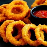 Crunchy Onion Rings · Golden-crisp deep fried onion rings.