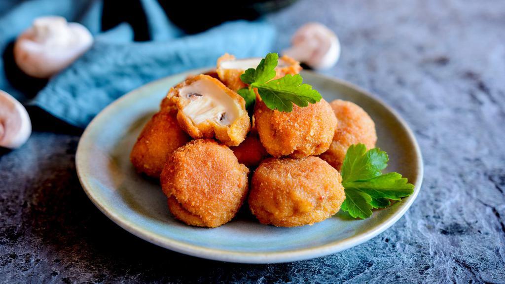 Fried Mushrooms · Freshly picked mushrooms battered in flour and deep fried got elegant taste.