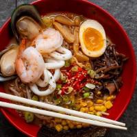 Spicy Seafood Ramen · Spicy creamy pork broth, shrimp, mussels, squids, egg-wheat noodles, sweet corn, black mushr...