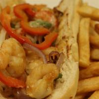 Shrimp Philly Cheesesteak · Half a pound of fresh shrimp grilled with peppers, onions, and mozzarella cheese Served on a...