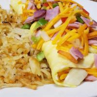 Western Omelet · Ham, peppers, onions, and American cheese. Served with hashbrowns.