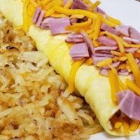 Ham & Cheese Omelet · Diced virginia ham and American cheese. Served with hashbrowns.