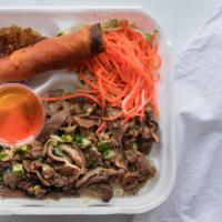 Grilled Pork Vermicelli & Eggrolls · Grilled Pork served with lettuce, cucumber, carrots, peanuts, fried shallots, and shrimp and...