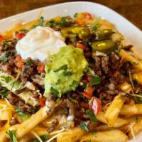 California Steak Fries · French fries topped with Mexican shredded cheese, melted queso, grilled steak, pico de gallo...