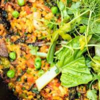 Rice & Peas · Traditional Rice and Beans, cooked with coconut milk and spices
