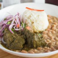 Seco De Res · Short rib stew, cilantro, canary beans, and white rice.