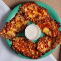Loaded Potato Skins · 5 delicious baked potato skin slices loaded with cheddar cheese and bacon and topped with ga...