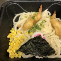 Udon · Udon noodle soup with fish cake, scallion, shrimp tempura.