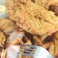 Beer Battered Fish Fry · Fresh grouper dipped in our own beer batter mix & deep fried to a golden brown.  Served w/cu...
