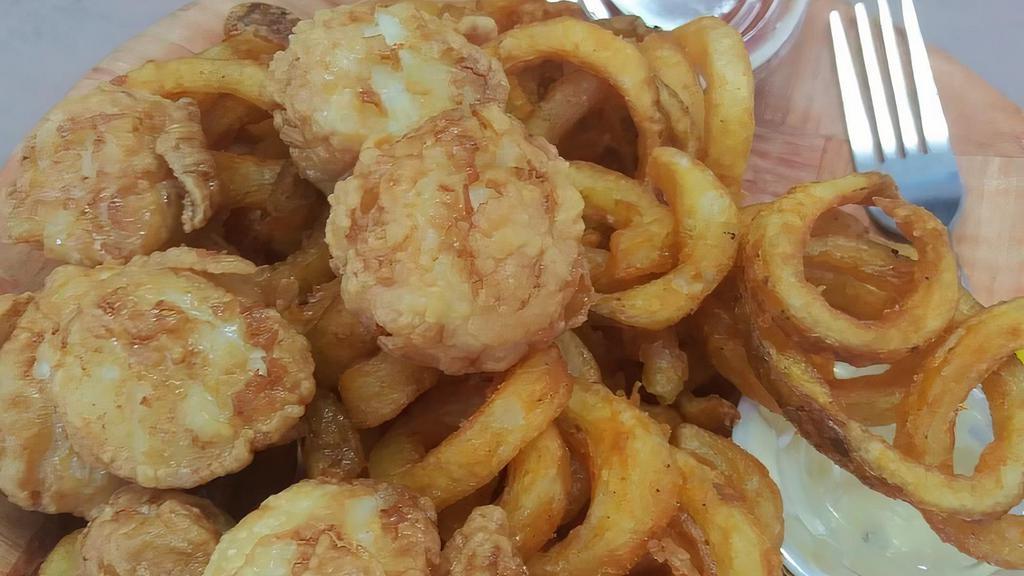 Fried Scallops · Lightly breaded & deep fried.  Served w/curly fries & cole slaw.