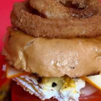 Glotona Burger · 10 ounces grilled Angus beef, fried or grilled chicken breast, lettuce tomato, onions, eggs,...