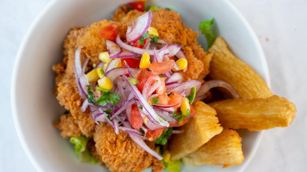 Chicharron De Pescado · Deep fried fish pieces with French fries or white rice.