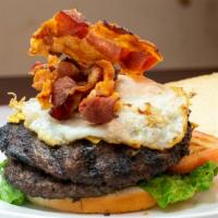 Hamburguesa Monster · Double burger, double cheese, double bacon, double egg, lettuce, tomato, potato sticks, sauc...