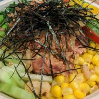 Spicy Tuna · Spicy. Ahi tuna, cucumber, edamame, masago, red onion, green onion, and seaweed nori, with s...