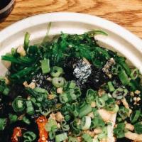 House Tuna · Ahi tuna, cucumber, edamame, seaweed salad, lettuce, green onion, and sesame with eel sauce....