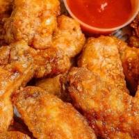 Chicken Wings  · Your choice of mild, hot, Cajun ranch, Cajun dry rub OR lemon pepper. One side of ranch OR b...