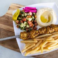 # 4 Shish-Tawook  Platter · Includes three sides of your choice.