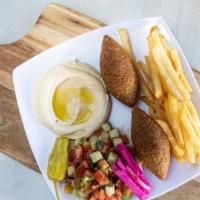 # 9 Beef Kibbe Platter  · Includes three sides of your choice.