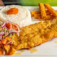 Pescado Frito · Fried fish filled. Served with white rice, yucca fries and red onion relish.