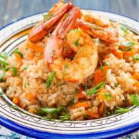 Arroz Con Camarones · the best Peruvian shrimp rice with Chicha de Jora liquor and pepper sauce