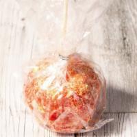 Strawberry Crunch Apples  · Granny Smith Apple coated with creamy white chocolate then dipped into the classic strawberr...