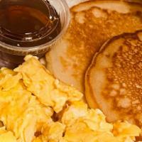 Pancake Breakfast Special · 3 Pancakes,  served with eggs, bacon, sausage or turkey bacon,  and a fruit cup.
