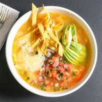 Tortilla Soup · Chicken broth with shredded chicken, rice, pico de gallo, and cheese. Topped with tortilla c...