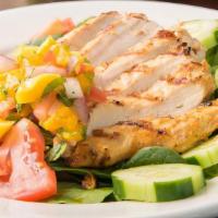 Mango Salad · Your choice of meat on a bed of spinach, tomatoes, cucumbers, and mango pico de gallo.