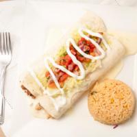 Burrito Supreme (1 Burrito) · Chicken or beef burrito topped with cheese sauce, lettuce, sour cream, and pico de gallo. Se...