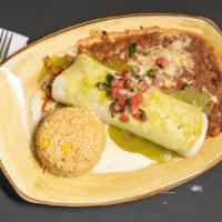 Burrito Al Pastor · A flour tortilla stuffed with pork grilled onions and pineapple covered with cheese sauce, g...