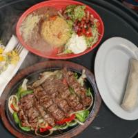 Grilled Fajitas · Your choice of meat cooked with onions and bell peppers.