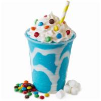 Cotton Candy Ice Cream Milk Shake · Blue cotton candy ice cream,  M&M's, whipped cream, and marshmallow creme.
