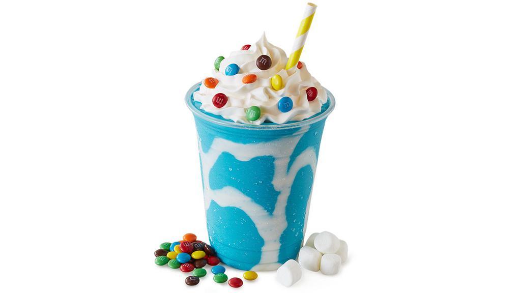 Cotton Candy Ice Cream Milk Shake · Blue cotton candy ice cream,  M&M's, whipped cream, and marshmallow creme.
