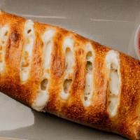 Specialty Stromboli · Rolled turnover. Add extra topping for an additional charge.