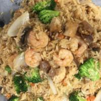House Fried Rice · Egg, mixed veggies, onion, broccoli, mushroom, chicken, shrimp & beef.