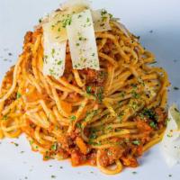 Bolognese Spaghetti · GROUND BEEF, TOMATO SAUCE, GARLIC, SAUTEED ONIONS, BASIL AND PARMESAN