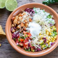 Burrito Bowl Cilantro · Heart mix of black beans, red and yellow peppers, red onions and corn on a bed of rice. Topp...