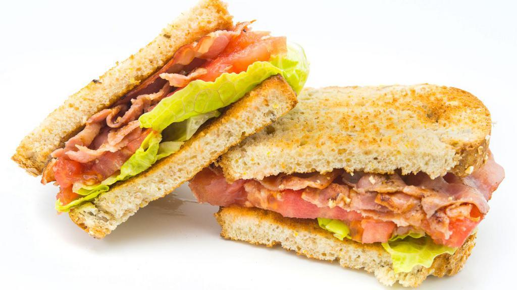 Blfgt · Our own, unique, Southwest-style spin on a BLT. Loads of crispy, center cut country or turkey bacon, golden brown, fried green tomato, and homemade lemon aioli sauce. Comes with one side of your choice.