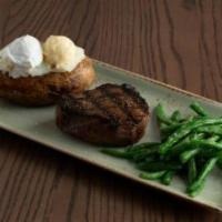 Top Sirloin - 9Oz · Seasoned and grilled to capture the meat's natural flavors. Served with your choice of two s...