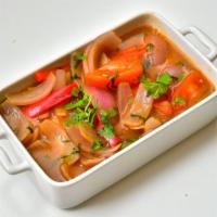 Parihuela · Sopa de pescado, pulpo, calamares, camarones y mejillones con ají panca peruano, tomate y ca...