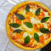 Margarita · A Milano's favorite. A traditional pizza with fresh tomatoes, garlic, basil and fresh mozzar...