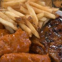 Ribs & Wings · 4 Bones of BBQ Ribs & 3 Chicken Wings served with side of choice.