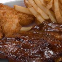 Ribs & Shrimp · 4 Bones of BBQ Ribs & 4 Fried Shrimp served with side of choice.